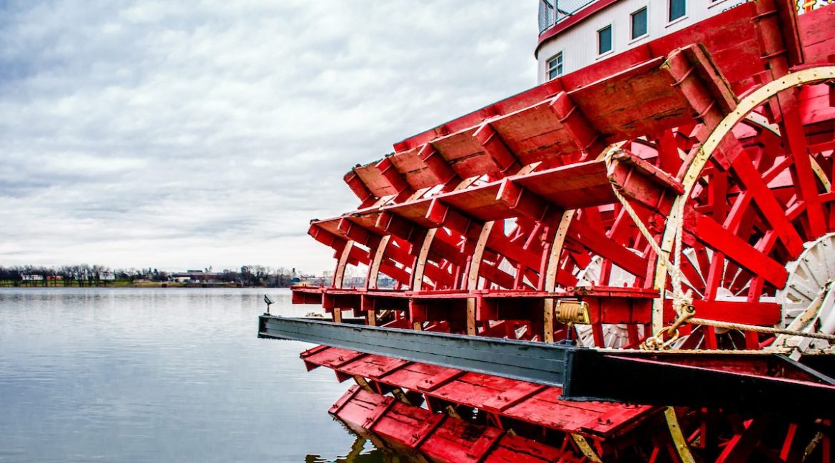 Photo of riverboat's red paddlewheel